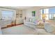 Bright den features a built-in desk, window seat, and comfortable seating at 435 S Gulfstream Ave # 1004, Sarasota, FL 34236