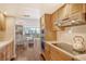 Eat-in kitchen features stainless steel appliances and updated cabinetry at 435 S Gulfstream Ave # 1004, Sarasota, FL 34236
