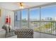Living room boasts amazing city views from floor-to-ceiling windows at 435 S Gulfstream Ave # 1004, Sarasota, FL 34236