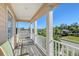 Peaceful balcony overlooking the neighborhood and trees at 4755 Woodbrook Dr, Sarasota, FL 34243