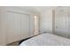 Cozy bedroom with white doors and a comfortable bed at 4755 Woodbrook Dr, Sarasota, FL 34243