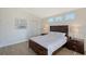 Serene bedroom featuring a bed and window seating at 4755 Woodbrook Dr, Sarasota, FL 34243