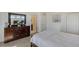 Spacious bedroom with a dresser and ensuite bathroom at 4755 Woodbrook Dr, Sarasota, FL 34243