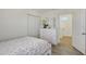 Bright bedroom with double door closet and wood-look floors at 4755 Woodbrook Dr, Sarasota, FL 34243