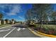 Gated community entrance with landscaping at 4755 Woodbrook Dr, Sarasota, FL 34243