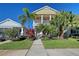 Two-story house with front porch, landscaping, and walkway at 4755 Woodbrook Dr, Sarasota, FL 34243