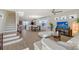 Spacious living room with hardwood floors and sectional sofa at 4755 Woodbrook Dr, Sarasota, FL 34243