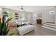 Living room with hardwood floors, sectional sofa, and TV at 4755 Woodbrook Dr, Sarasota, FL 34243