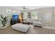 Living room with hardwood floors, sectional sofa, and TV at 4755 Woodbrook Dr, Sarasota, FL 34243