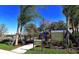Community playground with play equipment for children at 4755 Woodbrook Dr, Sarasota, FL 34243