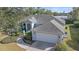 Single-story home with a two-car garage and spacious yard at 4757 Country Manor Dr, Sarasota, FL 34233