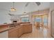 Open kitchen with breakfast nook and pool view at 4757 Country Manor Dr, Sarasota, FL 34233