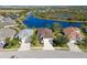 Aerial view of the neighborhood and waterfront property at 4831 Boston Common Gln, Bradenton, FL 34211