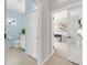 Small bathroom with light blue walls, white vanity, and a toilet at 4831 Boston Common Gln, Bradenton, FL 34211