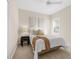 Bedroom with full-size bed and neutral decor at 4831 Boston Common Gln, Bradenton, FL 34211
