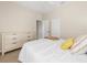 Bedroom with full-size bed and light wood dresser at 4831 Boston Common Gln, Bradenton, FL 34211