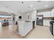 Open concept kitchen with island and stainless steel appliances at 4831 Boston Common Gln, Bradenton, FL 34211