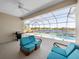 View of the pool and screened enclosure from the patio at 4831 Boston Common Gln, Bradenton, FL 34211