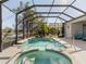 Inviting pool and spa with screened enclosure at 4831 Boston Common Gln, Bradenton, FL 34211