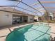 Large pool and spa with screened enclosure and patio at 4831 Boston Common Gln, Bradenton, FL 34211