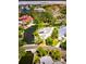 Desirable community with luxury homes, lush landscaping, and serene waterways, showcasing a prime waterfront location at 4839 Primrose Path, Sarasota, FL 34242