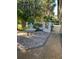Charming courtyard with a fountain and brick-paved patio at 4839 Primrose Path, Sarasota, FL 34242