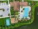 Community pool, playground, and tennis court from above at 4842 Pastel Ct, Sarasota, FL 34240