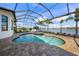 Relaxing pool and spa with lake view at 4842 Pastel Ct, Sarasota, FL 34240