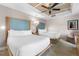 Spacious bedroom with two queen beds and ceiling fan at 5325 Marina Dr # 333, Holmes Beach, FL 34217