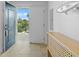 Inviting entryway with modern console table and balcony access at 5325 Marina Dr # 333, Holmes Beach, FL 34217