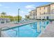 Inviting pool area with lounge chairs and water views at 5325 Marina Dr # 333, Holmes Beach, FL 34217