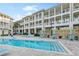 Resort-style pool with ample seating and landscaping at 5325 Marina Dr # 333, Holmes Beach, FL 34217