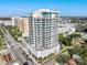 Aerial view of a modern highrise building in a city setting at 540 N Tamiami Trl # 702, Sarasota, FL 34236