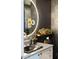 Modern bathroom with floating vanity, large mirror, and stylish fixtures at 540 N Tamiami Trl # 702, Sarasota, FL 34236