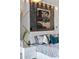 Spacious bedroom with large bed, decorative pillows, and statement art at 540 N Tamiami Trl # 702, Sarasota, FL 34236