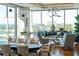 Bright dining room with hardwood floors and city views at 540 N Tamiami Trl # 702, Sarasota, FL 34236