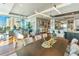 Open concept dining area with modern lighting and decor at 540 N Tamiami Trl # 702, Sarasota, FL 34236