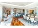 Open concept dining and kitchen area with hardwood floors at 540 N Tamiami Trl # 702, Sarasota, FL 34236