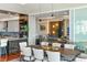 Modern dining room with hardwood floors and a large table at 540 N Tamiami Trl # 702, Sarasota, FL 34236