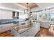Modern kitchen with large island and granite countertops at 540 N Tamiami Trl # 702, Sarasota, FL 34236