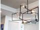 Contemporary kitchen with a unique geometric light fixture at 540 N Tamiami Trl # 702, Sarasota, FL 34236