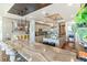 Modern kitchen with expansive island and high-end appliances at 540 N Tamiami Trl # 702, Sarasota, FL 34236
