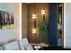 Media room with wood wall accents and modern lighting at 540 N Tamiami Trl # 702, Sarasota, FL 34236