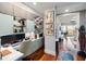 Bright home office with built-in shelving and dual computer monitors at 540 N Tamiami Trl # 702, Sarasota, FL 34236