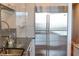 Stainless steel built-in refrigerator in modern kitchen at 540 N Tamiami Trl # 702, Sarasota, FL 34236