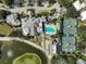 Community clubhouse with pool and tennis courts at 554 Fallbrook Dr, Venice, FL 34292