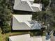 Aerial view of a house with a gray tile roof at 554 Fallbrook Dr, Venice, FL 34292