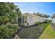 Well-maintained home with landscaping and screened patio at 554 Fallbrook Dr, Venice, FL 34292