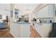 Bright kitchen with white cabinets, teal countertops, and ample workspace at 554 Fallbrook Dr, Venice, FL 34292