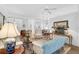 Bright and airy living room with hardwood floors at 554 Fallbrook Dr, Venice, FL 34292